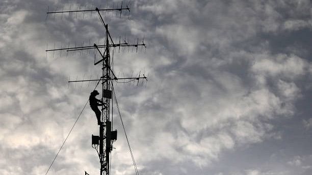 <div class="paragraphs"><p>Representative image of a man climbing a mobile tower.</p></div>