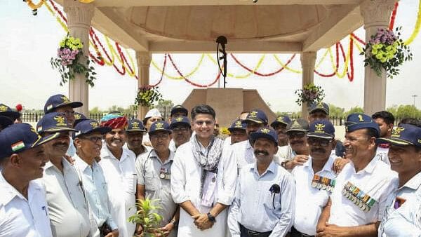 <div class="paragraphs"><p>Congress leader Sachin Pilot with families of martyred soldiers during inauguration of the Shahid Smarak, in Tonk, Monday, June 10, 2024.</p></div>