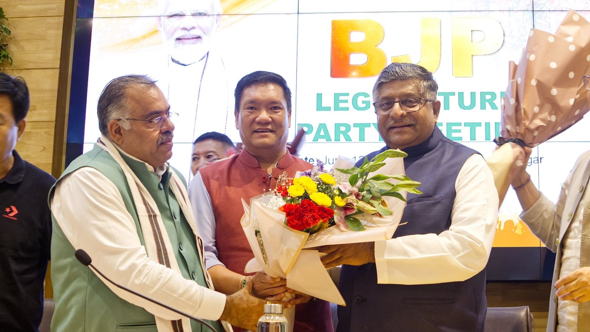 <div class="paragraphs"><p>Pema Khandu with senior BJP leaders&nbsp;Rajiv Chugh (L) and&nbsp;Ravi Shankar Prasad after being elected as the legislature party leader.</p></div>