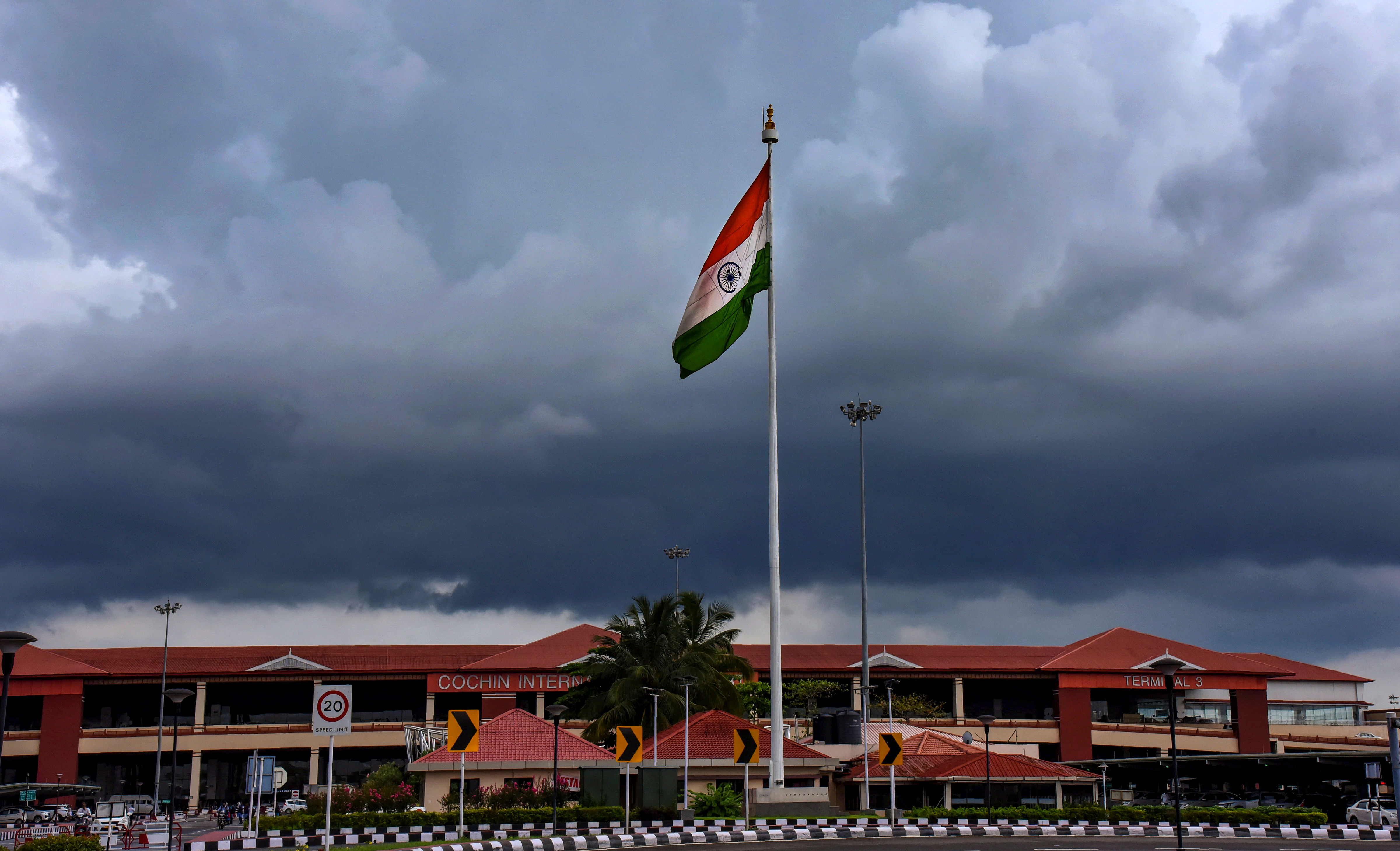 <div class="paragraphs"><p>The Indian national flag waves amid cloud cover over the Cochin International Airport, in Kochi. </p></div>