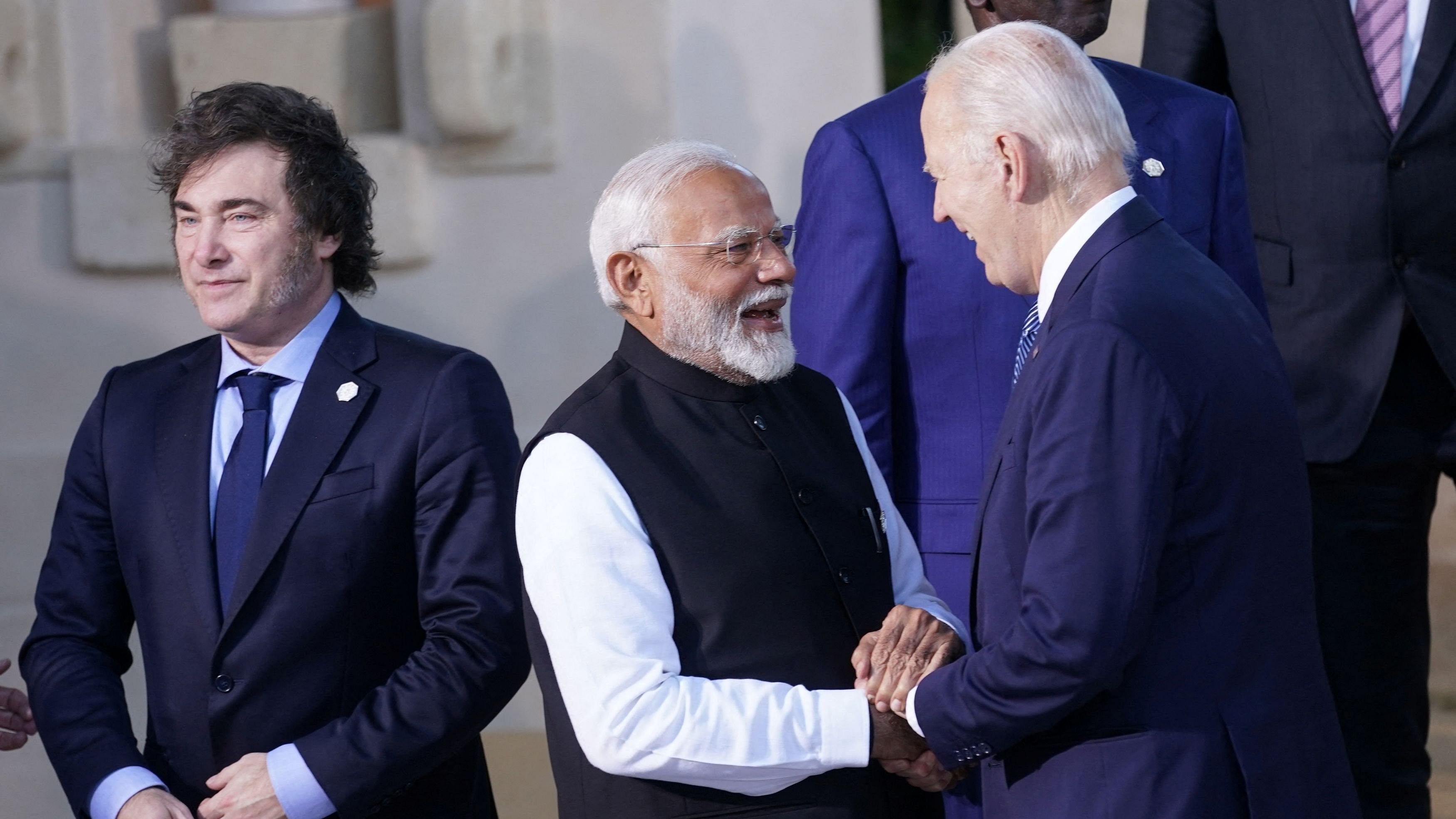 <div class="paragraphs"><p>US President Joe Biden shakes hands with Prime Minister Narendra Modi next to Argentina's President Javier Milei during the family photo session on the second day of the G7 summit at the Borgo Egnazia resort in Savelletri, Puglia, Italy, June 14, 2024. </p></div>