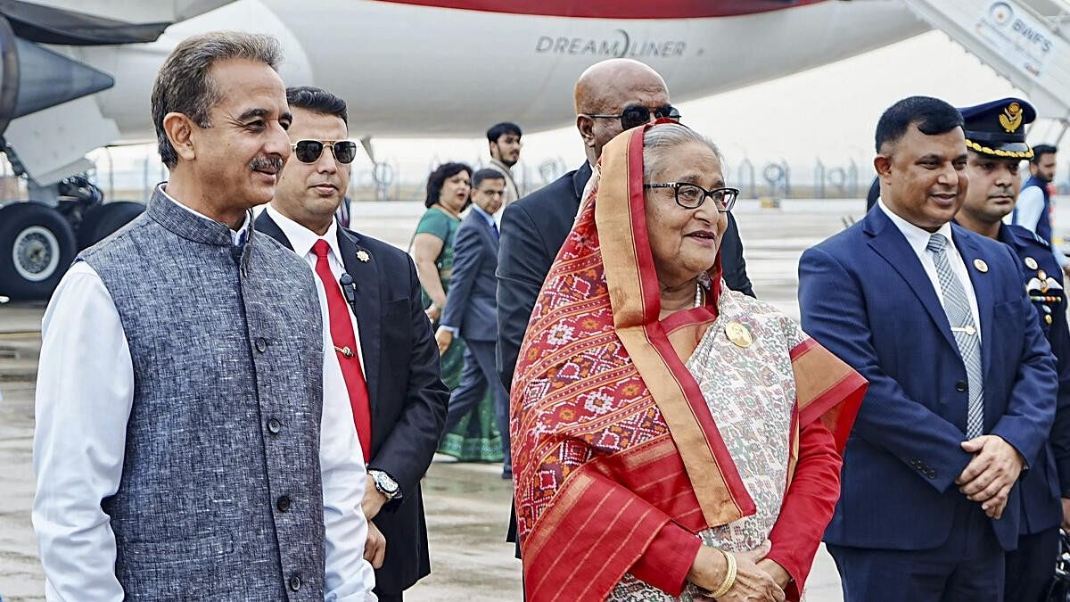 <div class="paragraphs"><p>Prime Minister of Bangladesh Sheikh Hasina being welcomed by Minister of State for External Affairs Kirti Vardhan Singh.</p></div>