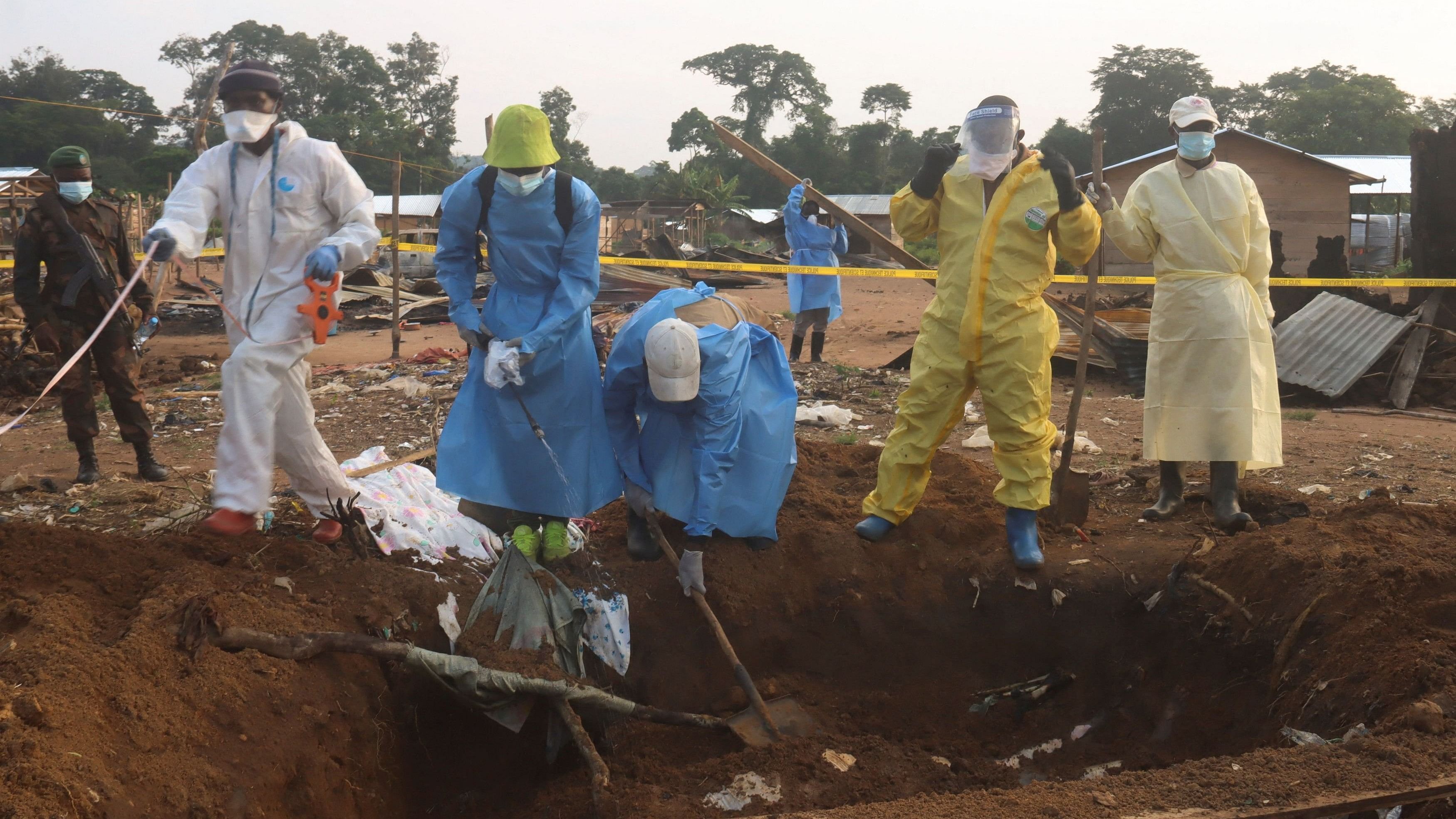 <div class="paragraphs"><p>Volunteers and Congolese security officers dig a shallow grave in search for the bodies of residents killed following an attack by suspected Islamist rebels from the Allied Democratic Forces  in Beni territory of eastern Democratic Republic of Congo.</p></div>