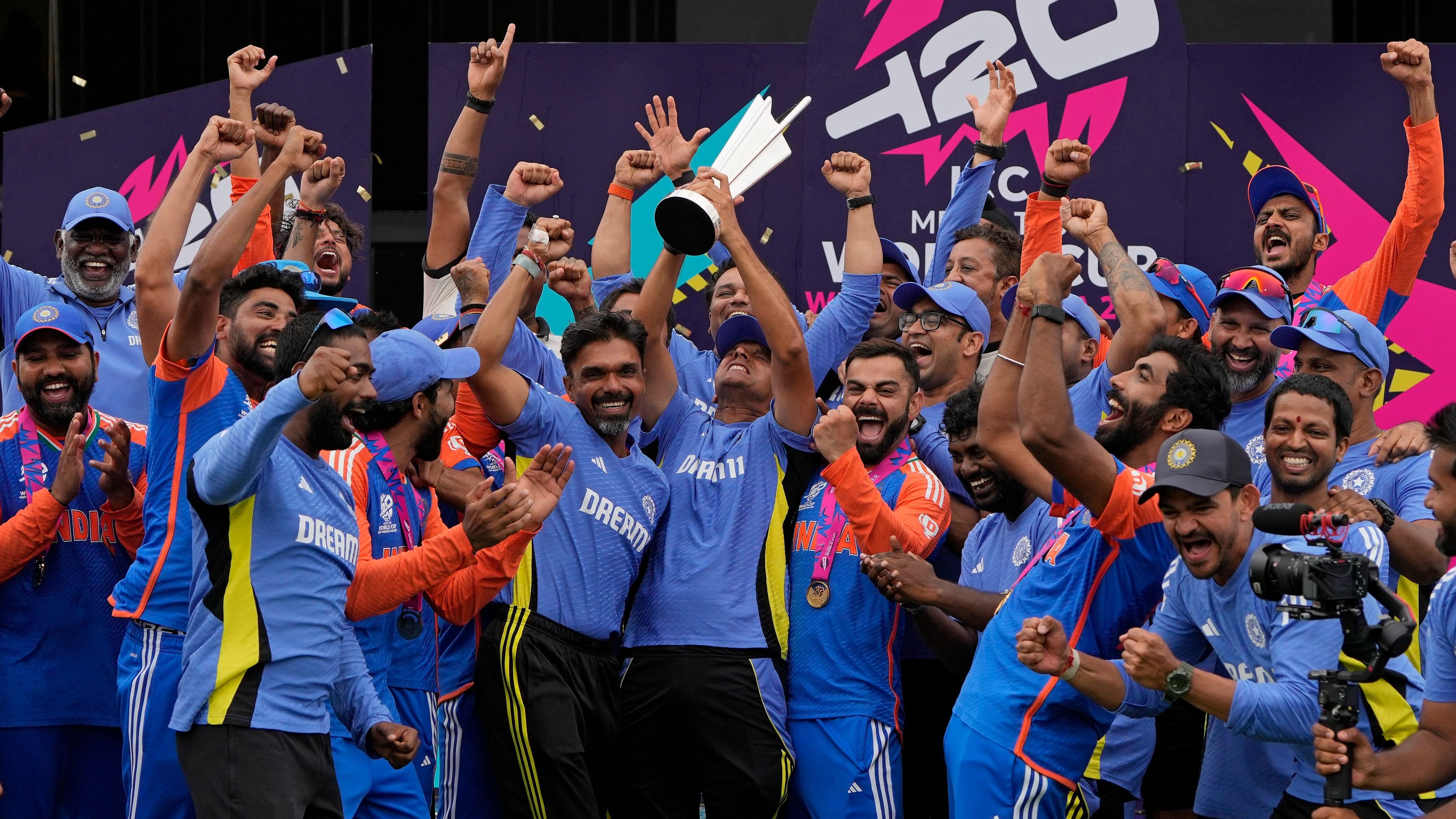 <div class="paragraphs"><p>The India team celebrates after winning the ICC T20 World Cup final against South Africa at Kensington Oval on Saturday. </p></div>