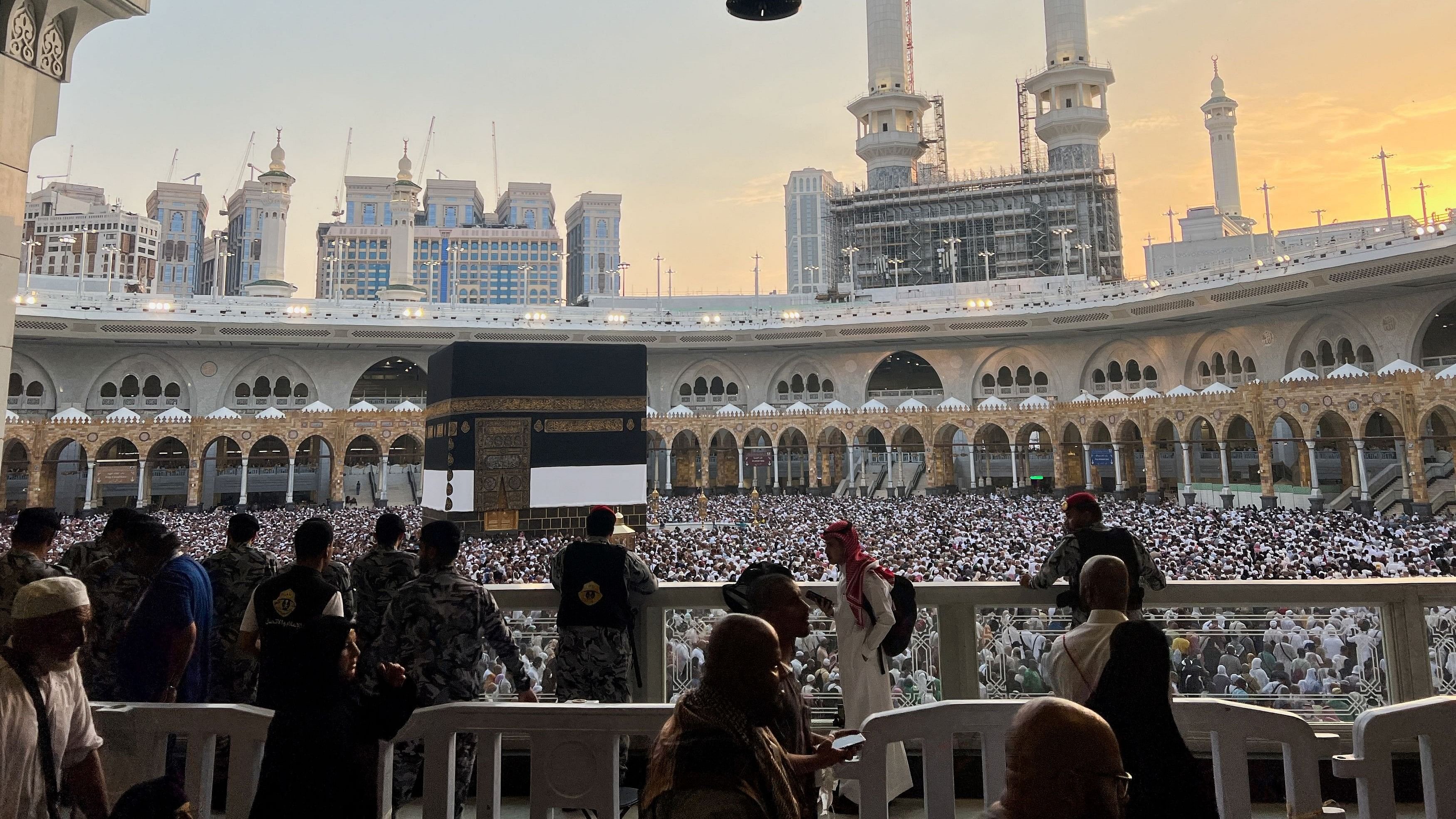 <div class="paragraphs"><p>Police officers stand guard as Muslim pilgrims circle the Kaaba as they perform Tawaf at the Grand Mosque, during the annual Hajj pilgrimage, in Mecca, Saudi Arabia, June 18, 2024. </p></div>