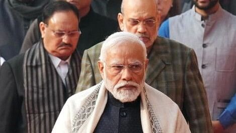 <div class="paragraphs"><p>PM Narendra Modi is  with BJP leaders Amit Shah and J P Nadda in the background.</p></div>