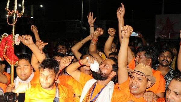 <div class="paragraphs"><p>Pilgrims shout slogans as the first batch of pilgrims leaves for the Amarnath Yatra, in Jammu, Friday.&nbsp;</p></div>