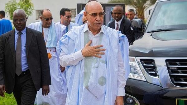 <div class="paragraphs"><p>Mauritania's President Mohamed Ould Ghazouani arrives to cast his vote in the country's presidential election in Nouakchott, Mauritania June 29</p></div>