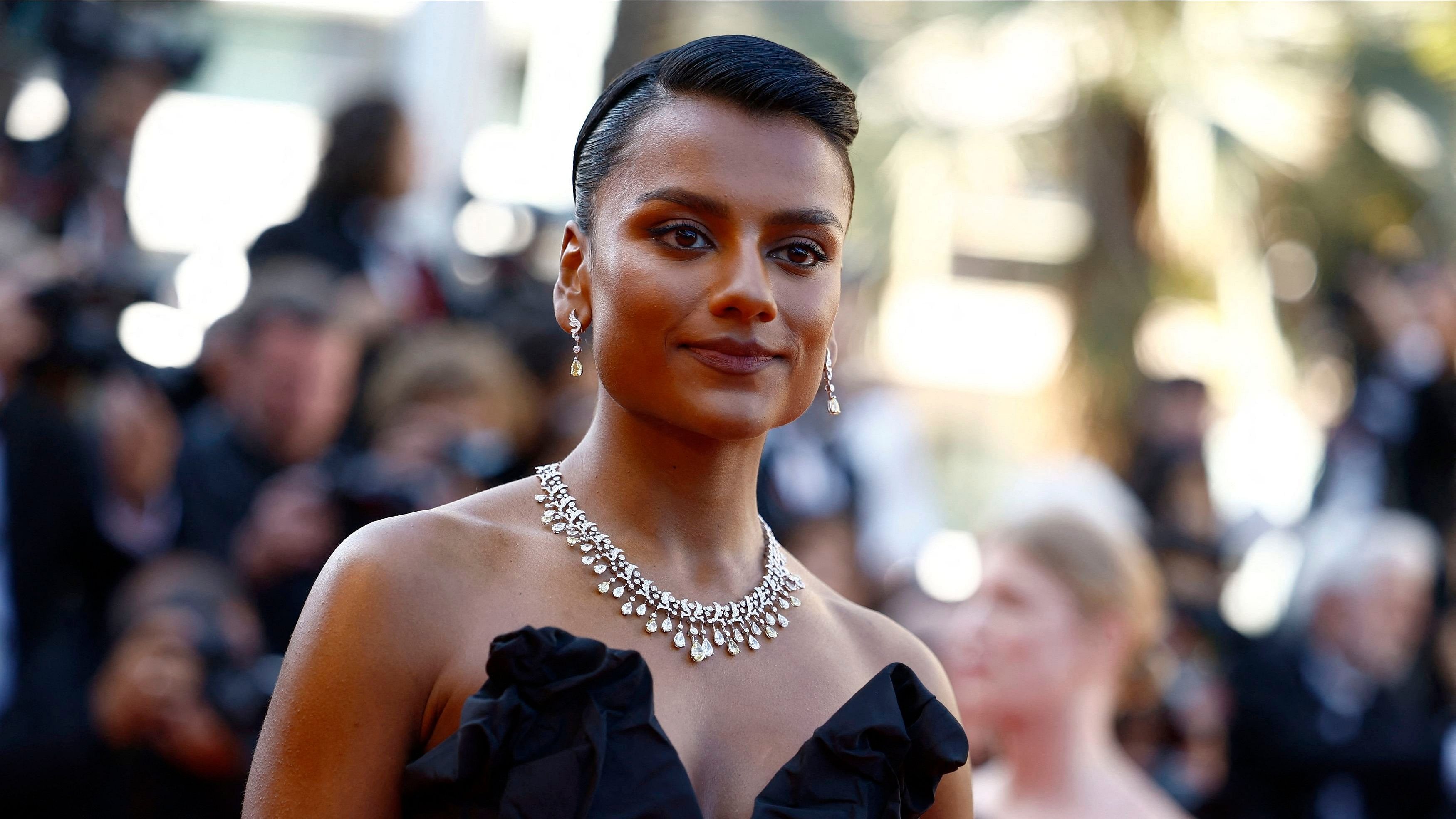 <div class="paragraphs"><p>Simone Ashley poses on the red carpet to attend the closing ceremony of the 77th Cannes Film Festival in Cannes, France, May 25, 2024. </p></div>