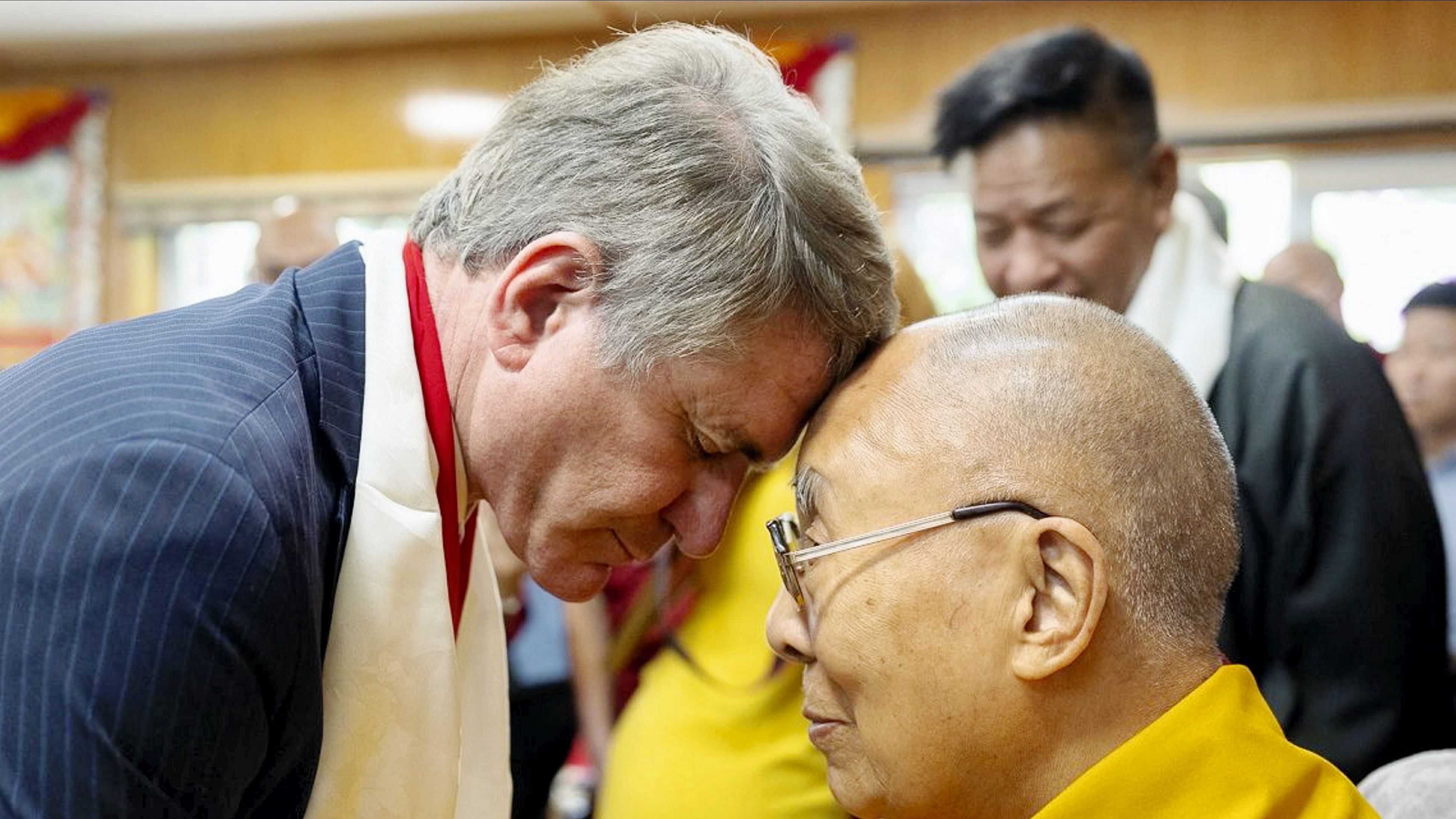 <div class="paragraphs"><p> Tibetan spiritual leader Dalai Lama being greeted by US representative Michael McCaul.</p></div>