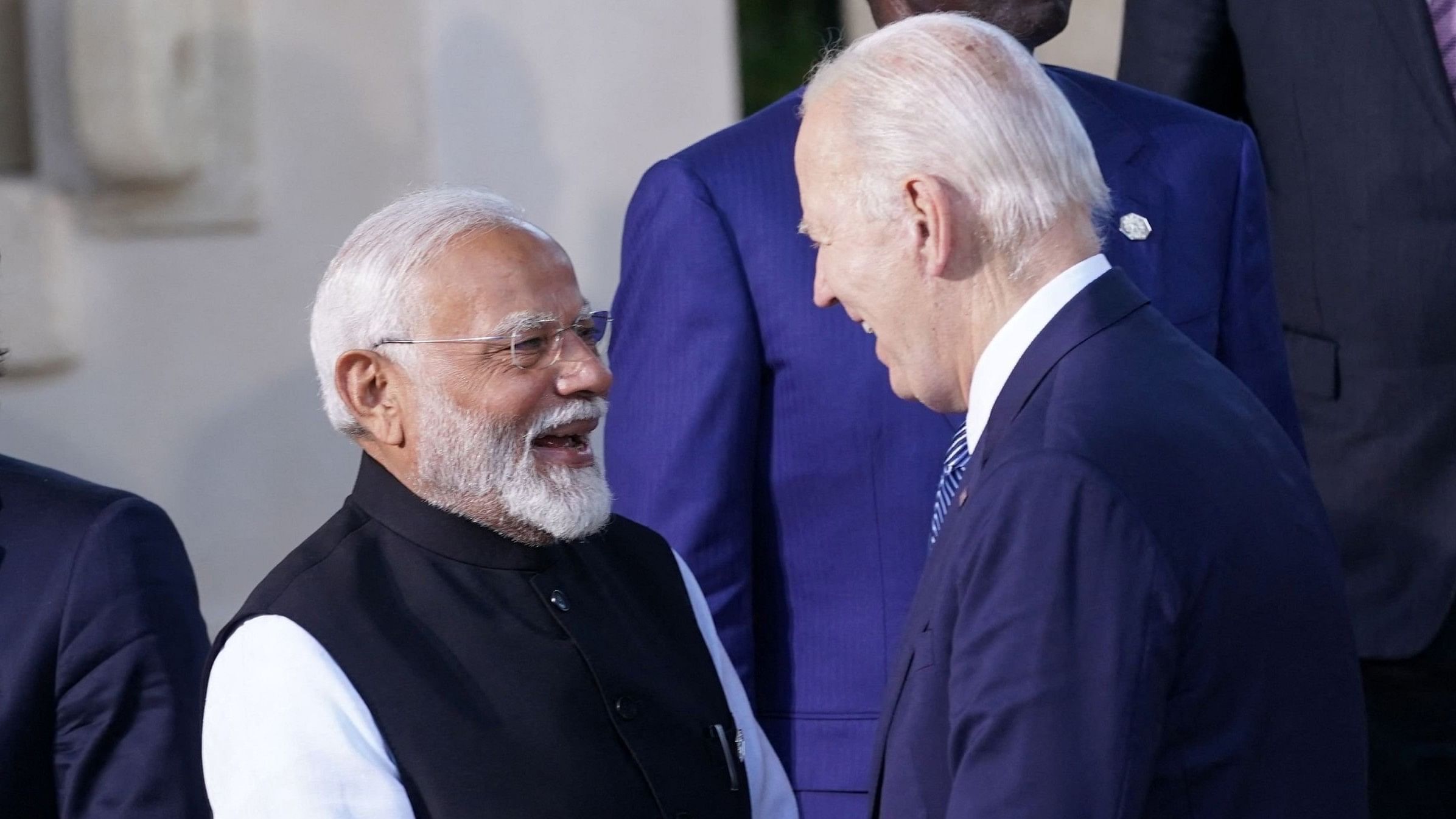 <div class="paragraphs"><p>US President Joe Biden shakes hands with Prime Minister Narendra Modi  during the 'G7 family photo' session on the second day of the G7 summit at the Borgo Egnazia resort in Savelletri, Puglia, Italy, June 14, 2024. </p></div>