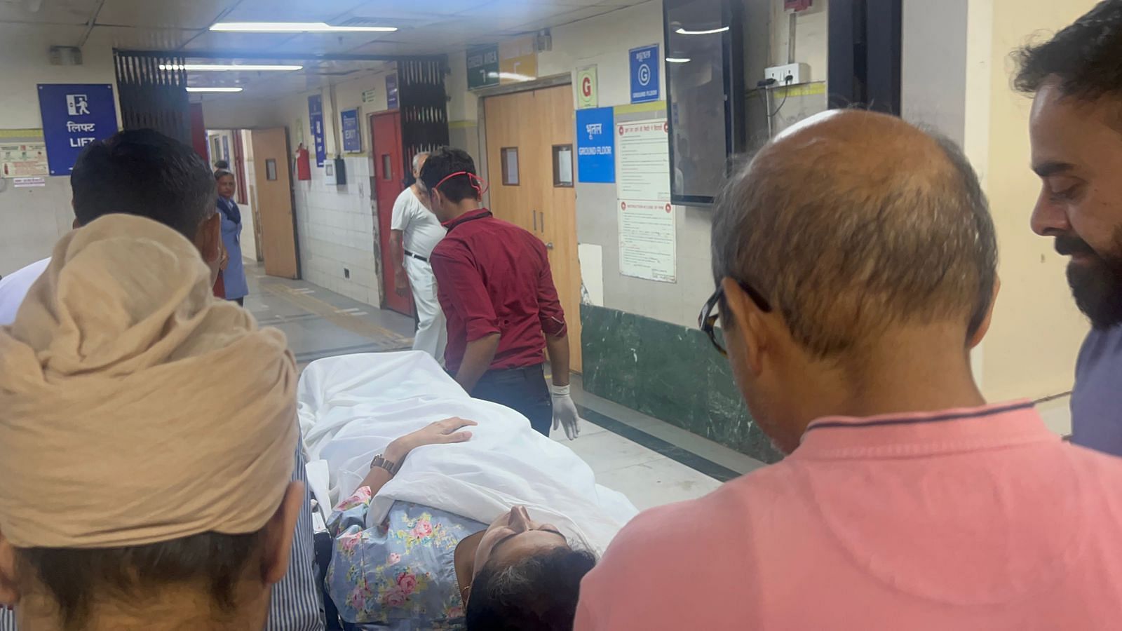 <div class="paragraphs"><p>Atishi being stretchered into the LNJP hospital.</p></div>