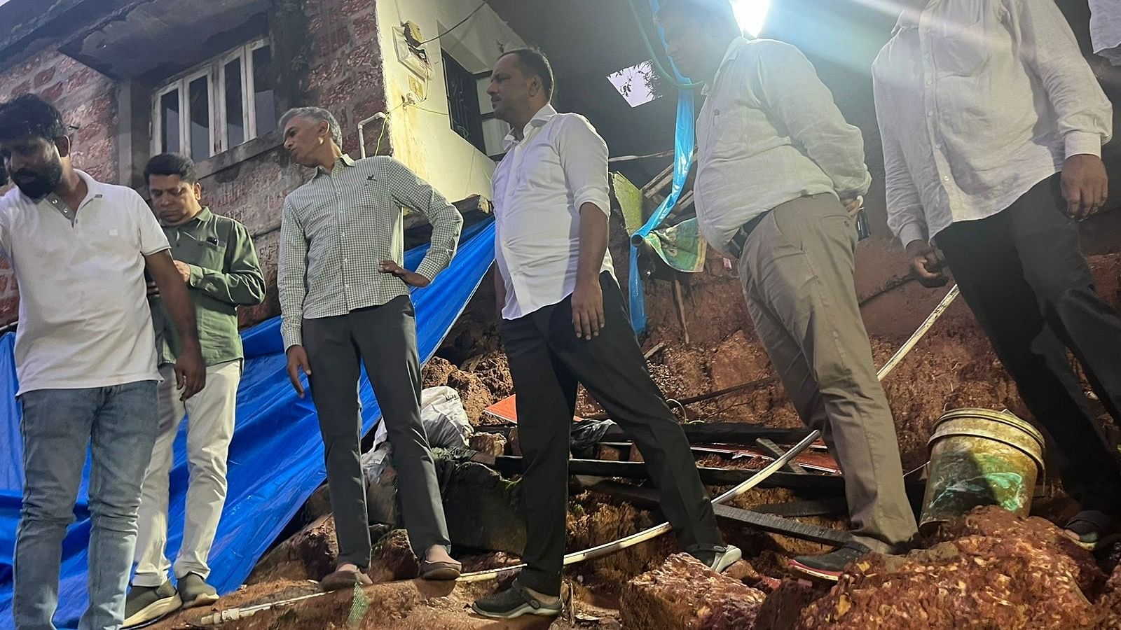 <div class="paragraphs"><p>Revenue Minister Krishna Byre Gowda visited the spot where four members of a family died following the collapse of a retaining wall at Kuthar on Wednesday.</p></div>