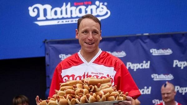 <div class="paragraphs"><p>World Champion Joey Chestnut during the weigh-in ceremony ahead of 2023 Nathan's Famous Fourth of July International Hot Dog Eating Contest in Coney Island Brooklyn in New York City</p></div>