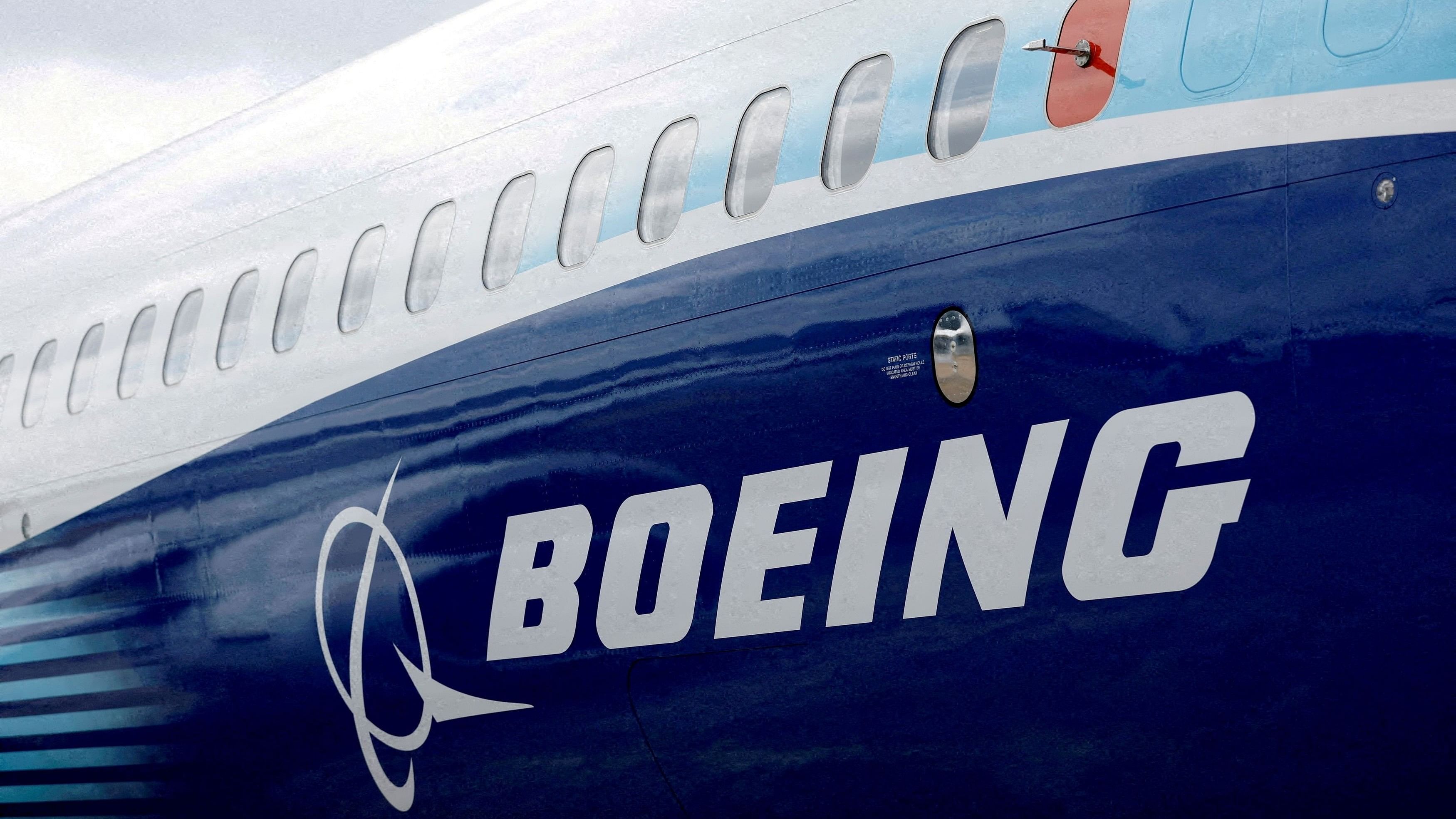 <div class="paragraphs"><p>The Boeing logo is seen on the side of a Boeing 737 MAX.</p></div>