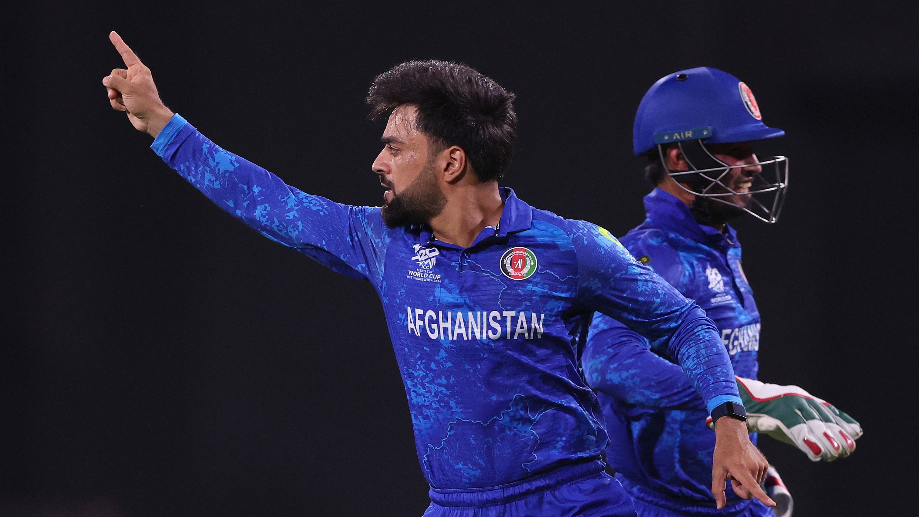 <div class="paragraphs"><p>Afghanistan's Rashid Khan celebrates a wicket.</p></div>