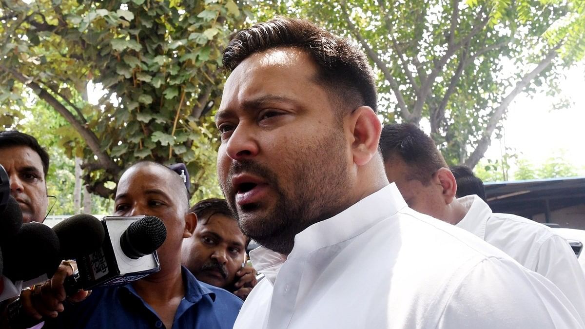 <div class="paragraphs"><p>RJD leader Tejashwi Yadav interacts with the media before leaving for Delhi in Patna on Wednesday, June 5, 2024. </p></div>