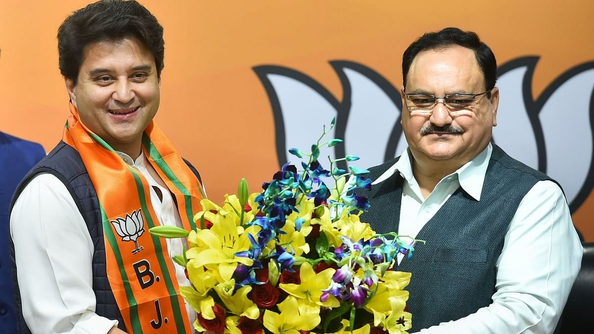 <div class="paragraphs"><p>Jyotiraditya Scindia with J P Nadda.</p></div>