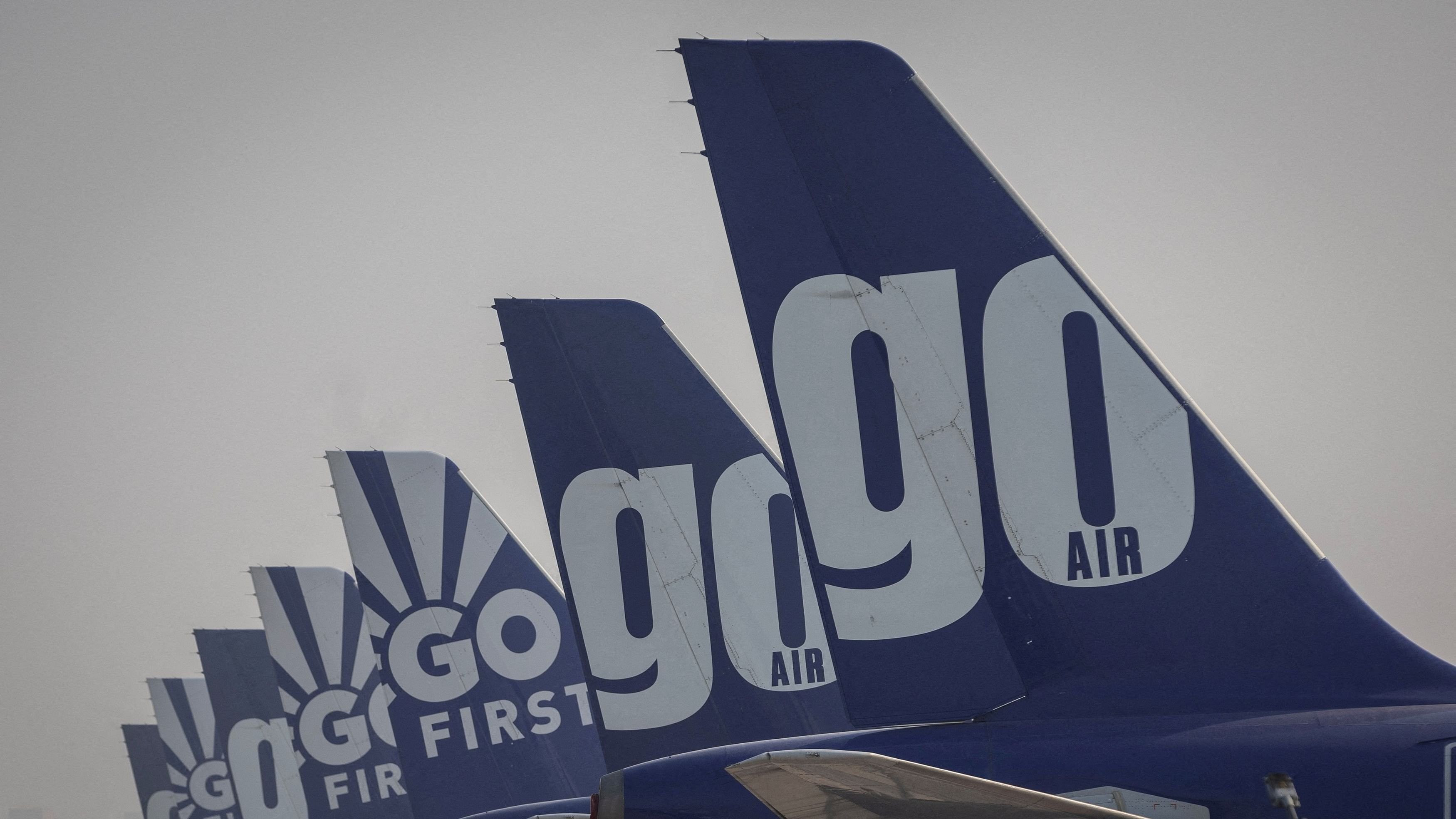 <div class="paragraphs"><p>The tail fins of Go First airline, formerly known as GoAir, passenger aircrafts are seen parked on the tarmac at the airport in New Delhi, India, May 11, 2023. </p></div>