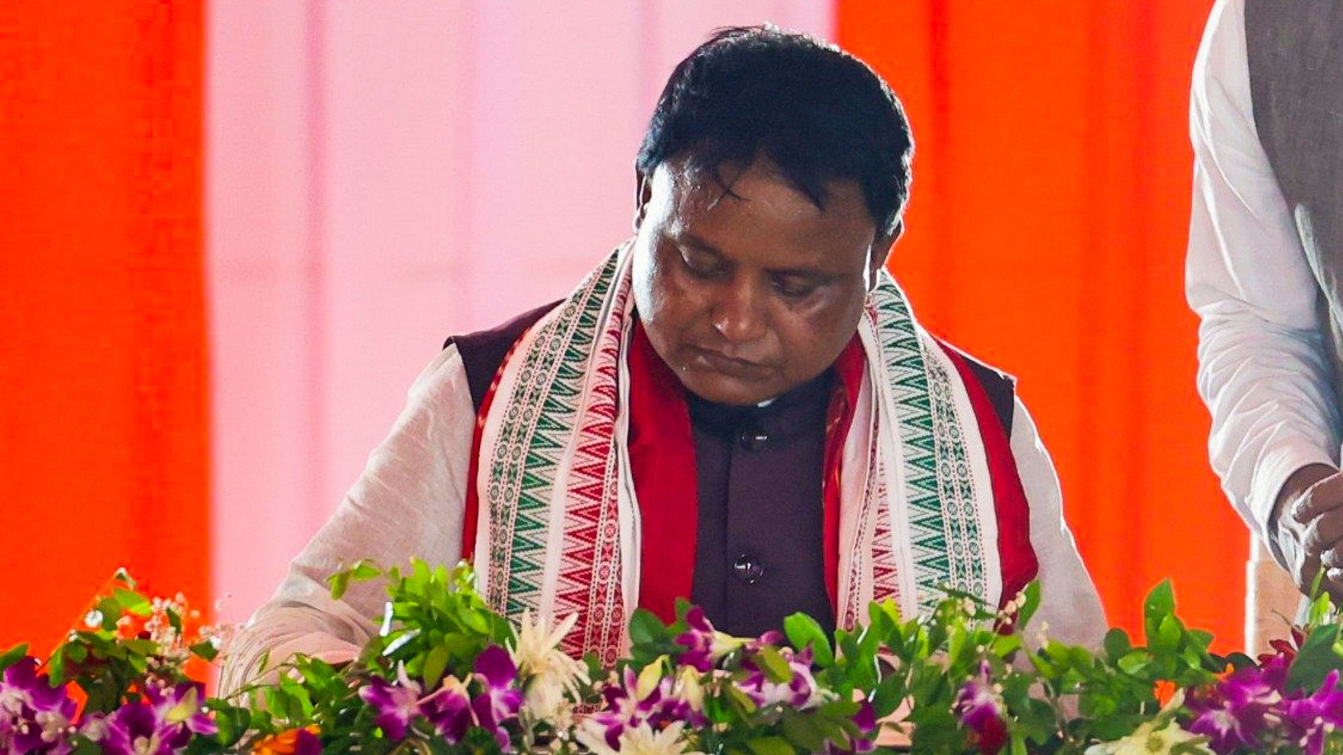 <div class="paragraphs"><p>Mohan Charan Majhi takes oath during the swearing-in ceremony of the new Odisha government.</p></div>