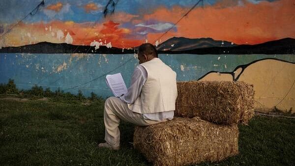 <div class="paragraphs"><p>An inmate reads his lines before performing for fellow inmates in the ancient Greek tragedy "Antigone", at the yard in Korydallos Prison, in Korydallos, Greece, June 10, 2024.</p></div>