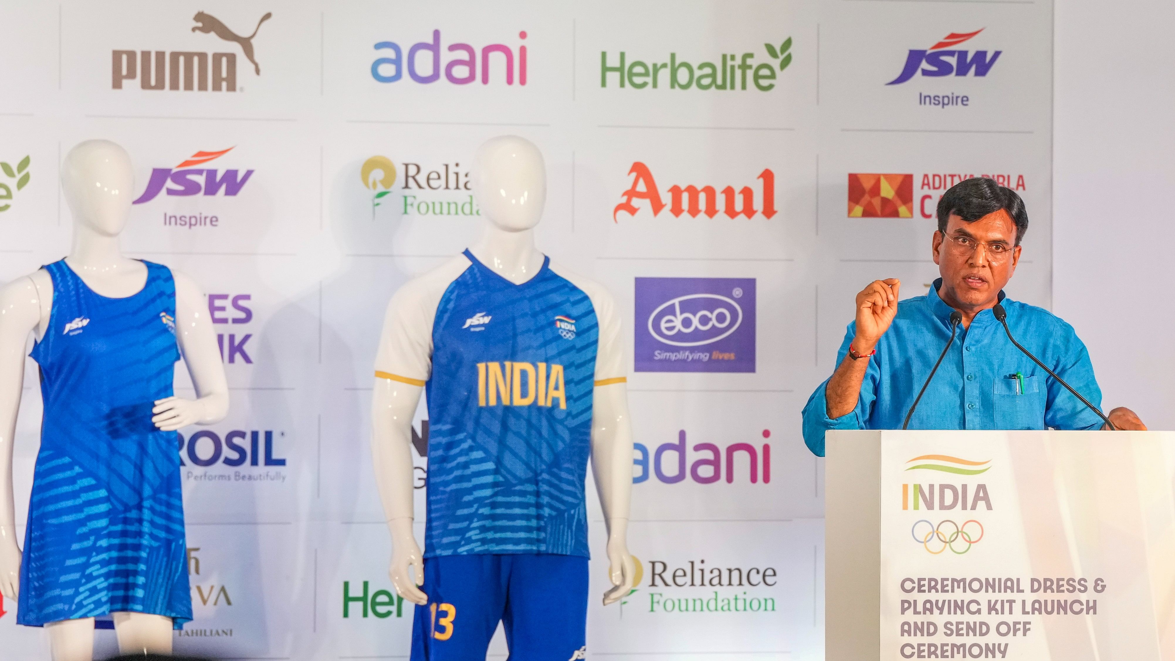 <div class="paragraphs"><p>Union Minister of Youth Affairs and Sports Mansukh Mandaviya speaks during the launch of the ceremonial dress and playing kit for the upcoming Paris Olympics, in New Delhi, Sunday.</p></div>