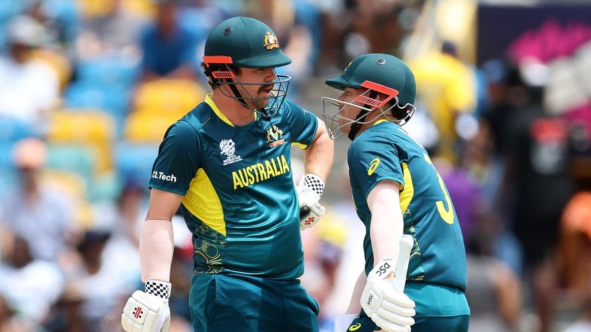 <div class="paragraphs"><p>Australia's Travis Head and David Warner talk during play.</p></div>