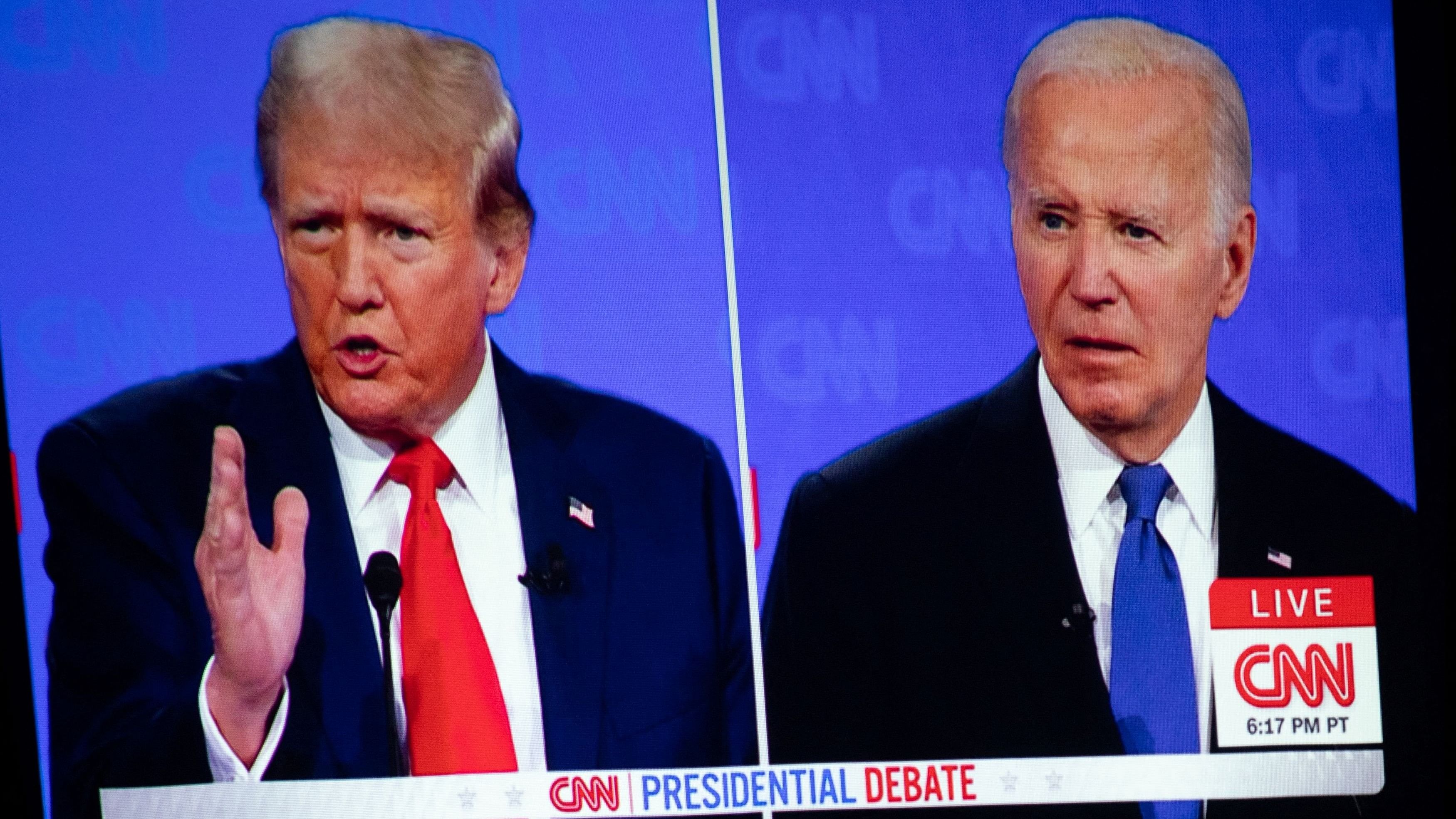 <div class="paragraphs"><p>The first presidential debate between US President Joe Biden and former US President and Republican presidential candidate Donald Trump is projected on a screen projector during a watch party hosted by the Michigan Conservative Coalition in Novi, Michigan, US on June 27, 2024.     </p></div>