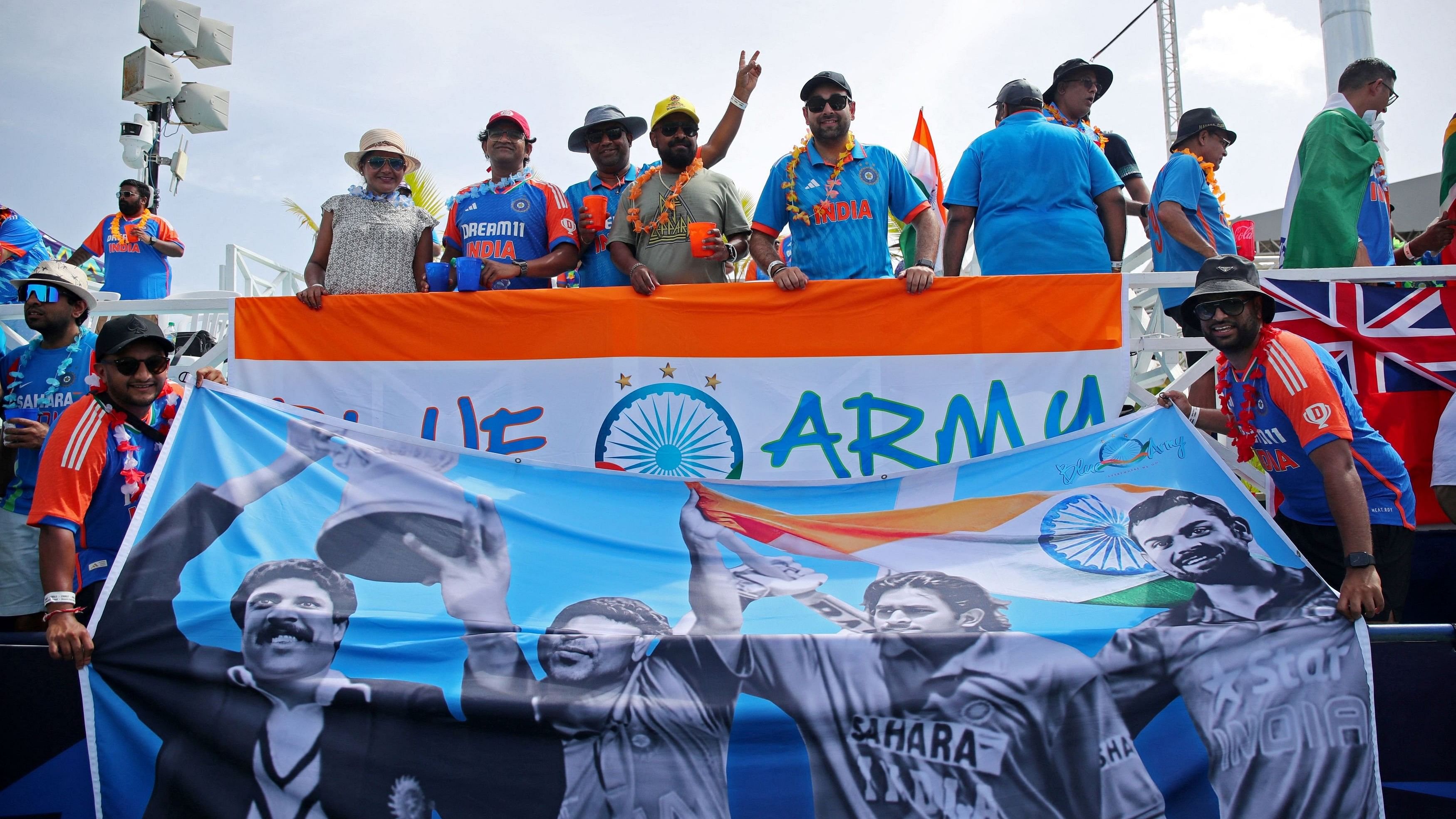 <div class="paragraphs"><p>India fans display a banner in the stands before the match.</p></div>