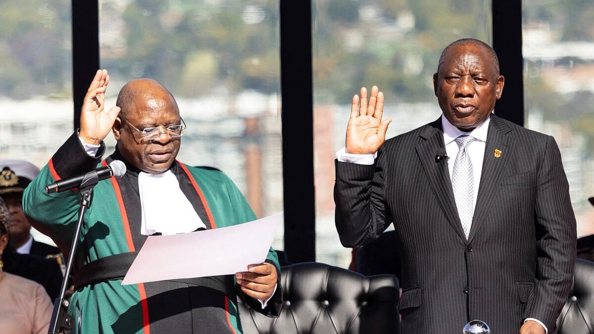 <div class="paragraphs"><p>Cyril Ramaphosa gestures on the day he takes the oath of office for his second term as South African President at the Union Buildings in Pretoria, South Africa.&nbsp;</p></div>