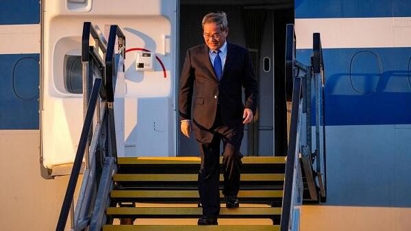 <div class="paragraphs"><p>China's Premier Li Qiang arrives at Adelaide Airport on June 15, 2024, in Adelaide, Australia. </p></div>