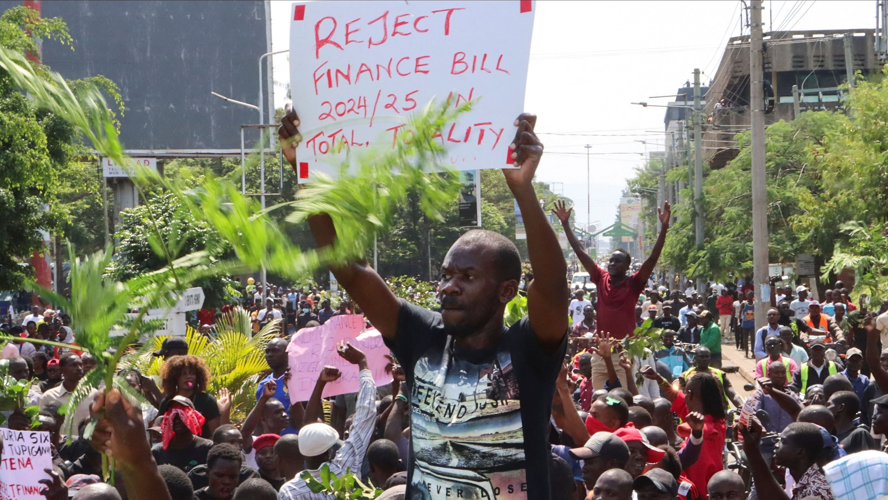 <div class="paragraphs"><p>Protesters react during a demonstration against Kenya's proposed finance bill 2024/2025 in Kisumu town, Kenya.</p></div>