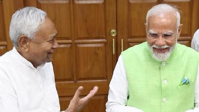 <div class="paragraphs"><p>Prime Minister Narendra Modi with JD(U) chief Nitish Kumar&nbsp;during National Democratic Alliance (NDA) meeting at PM's residence, in New Delhi.</p></div>