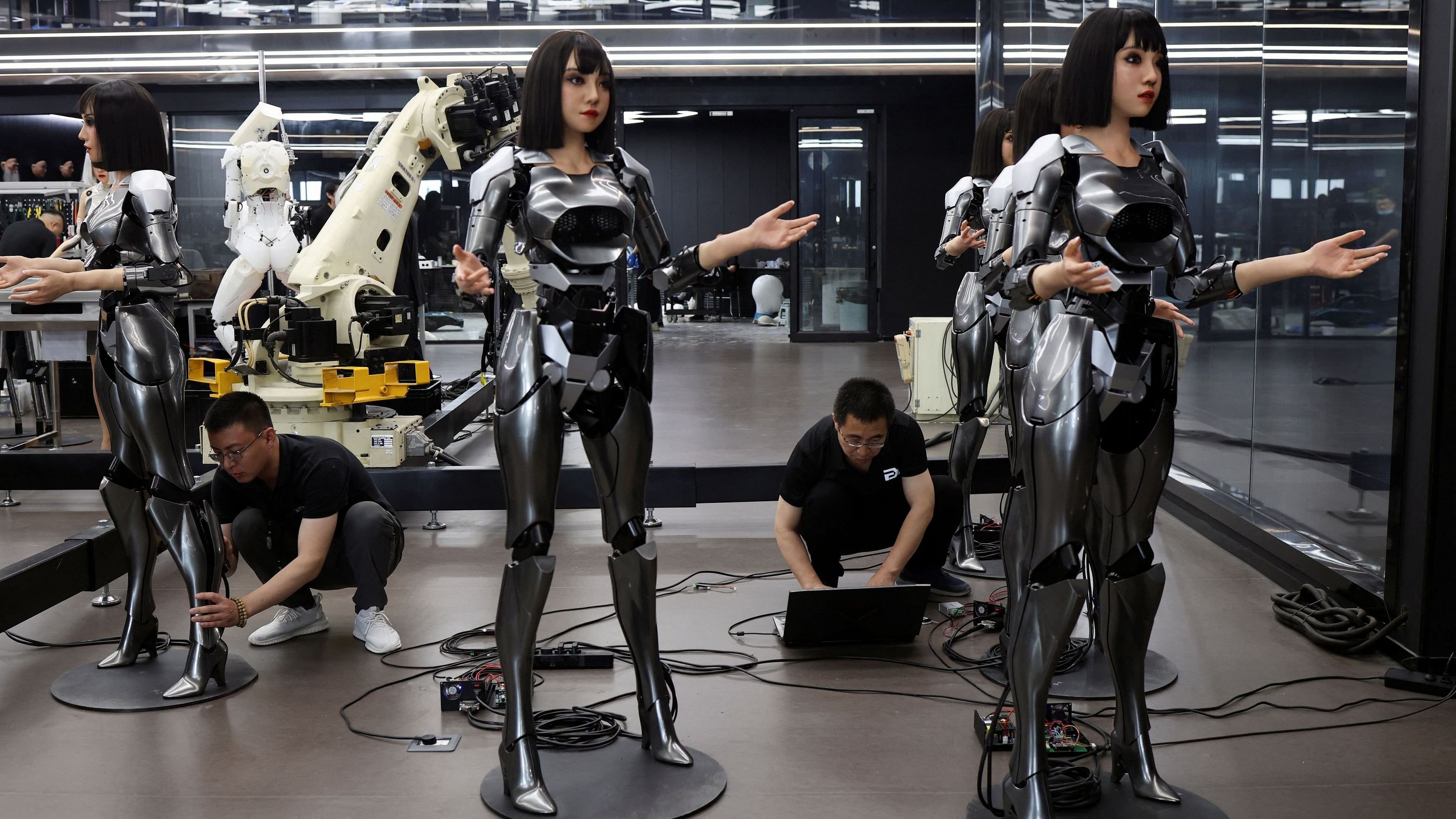 <div class="paragraphs"><p>Employees work on humanoid robots at the office of developer Ex-Robots in Dalian, Liaoning province, China.</p></div>