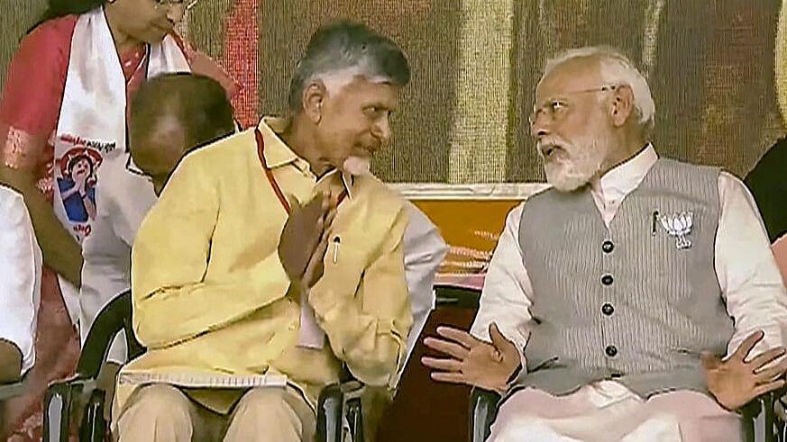 <div class="paragraphs"><p>Narendra Modi with TDP chief N Chandrababu Naidu</p></div>