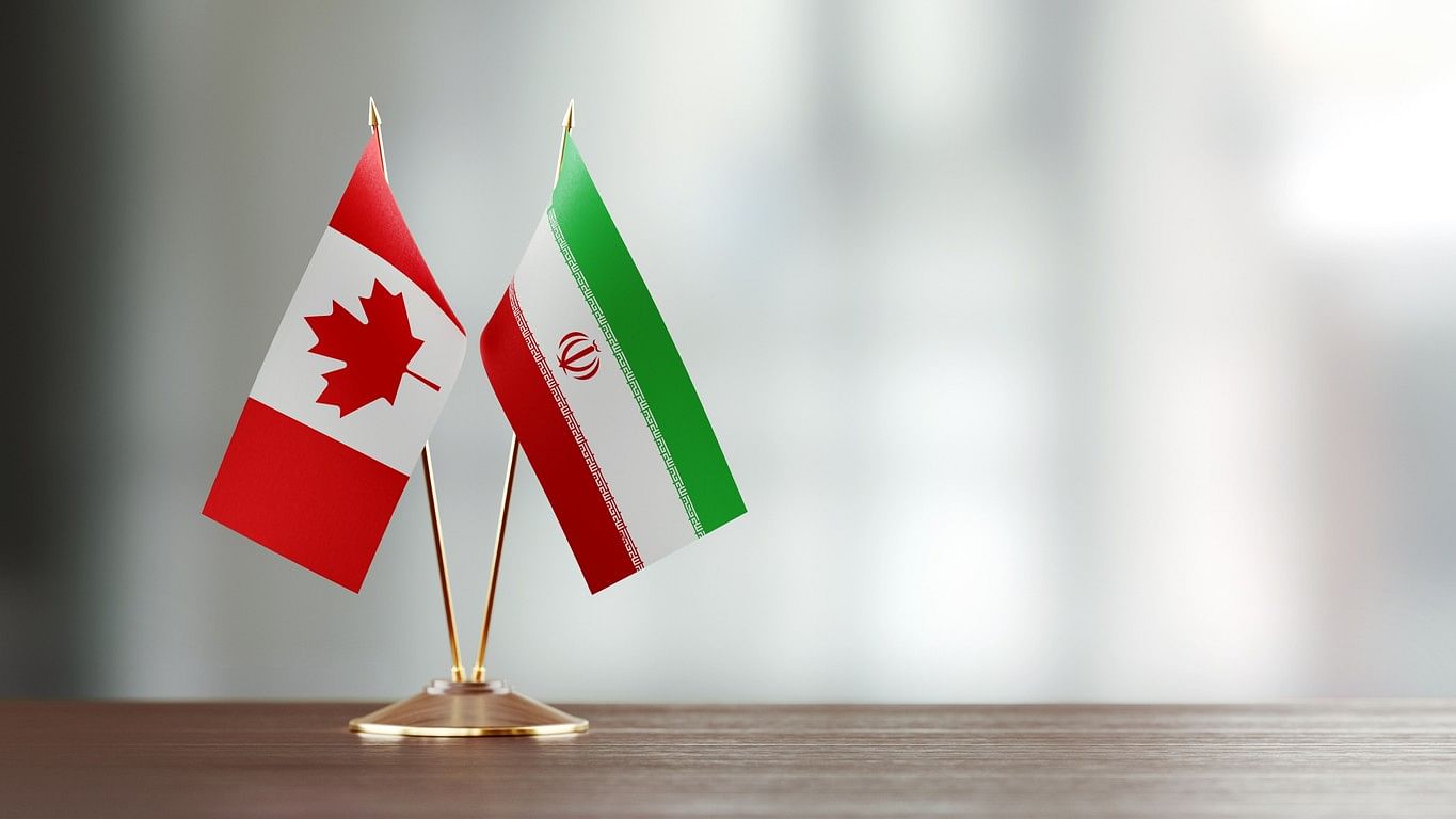 <div class="paragraphs"><p>Canada and Iran's national flags.</p></div>