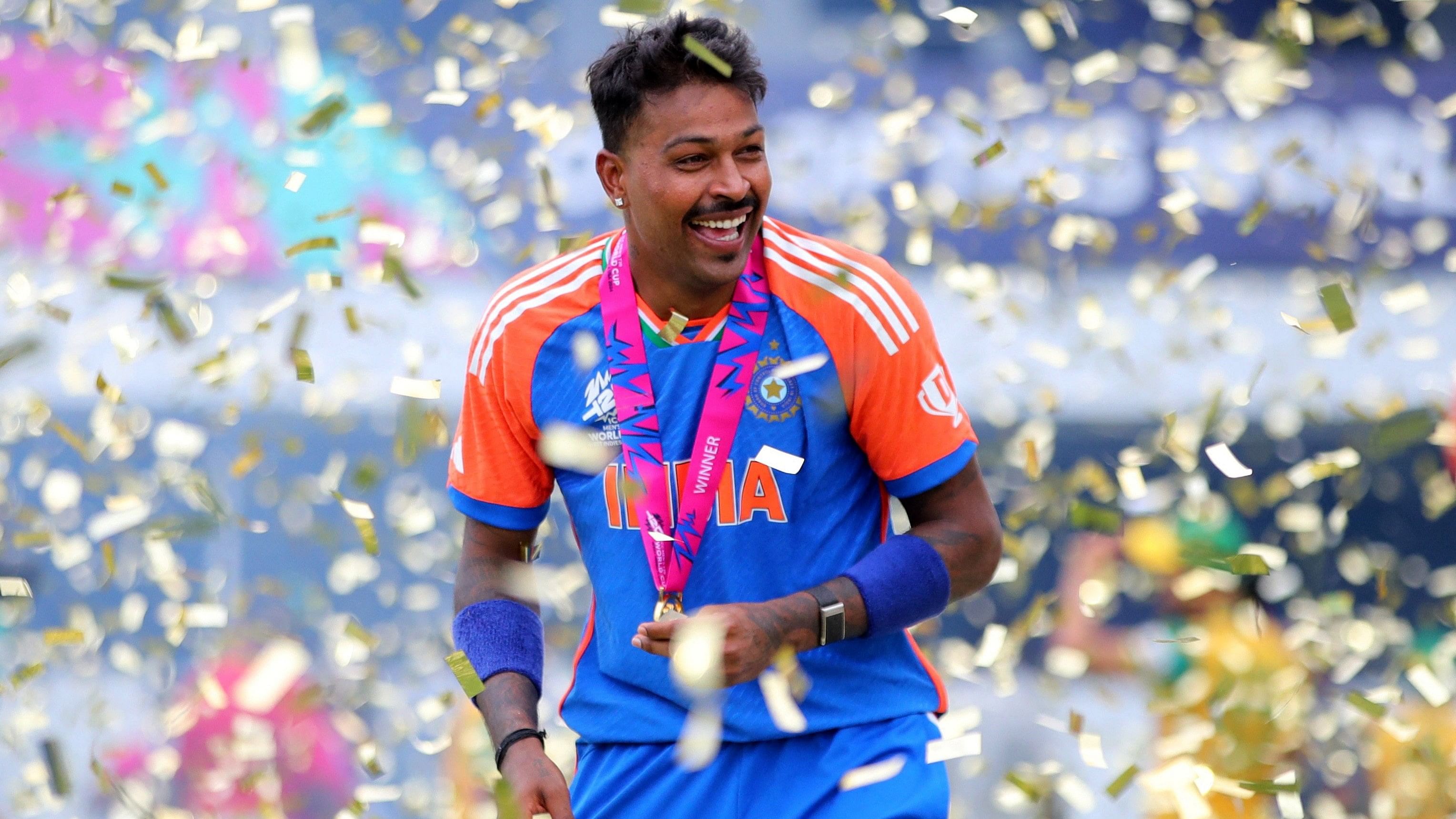 <div class="paragraphs"><p>Hardik Pandya celebrates with his medal after winning the T20 World Cup.</p></div>