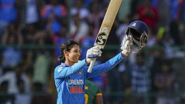 <div class="paragraphs"><p>Indian batter Smriti Mandhana celebrates her century during the first women's ODI cricket match between India and South Africa at M Chinnaswamy Stadium, in Bengaluru.</p></div>