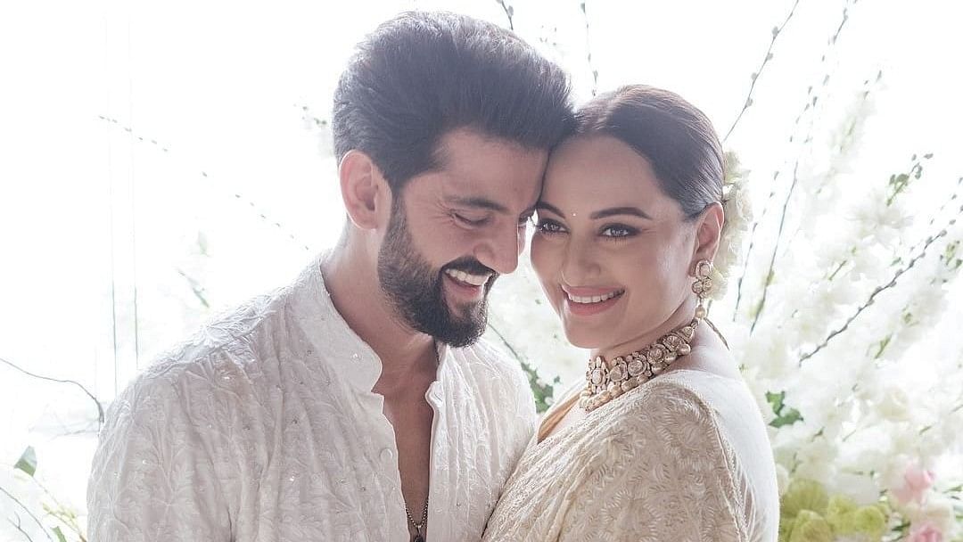 <div class="paragraphs"><p>Actor couple Sonakshi Sinha and Zaheer Iqbal poses for photos at their wedding ceremony, in Mumbai, Sunday, June 23, 2024.</p></div>