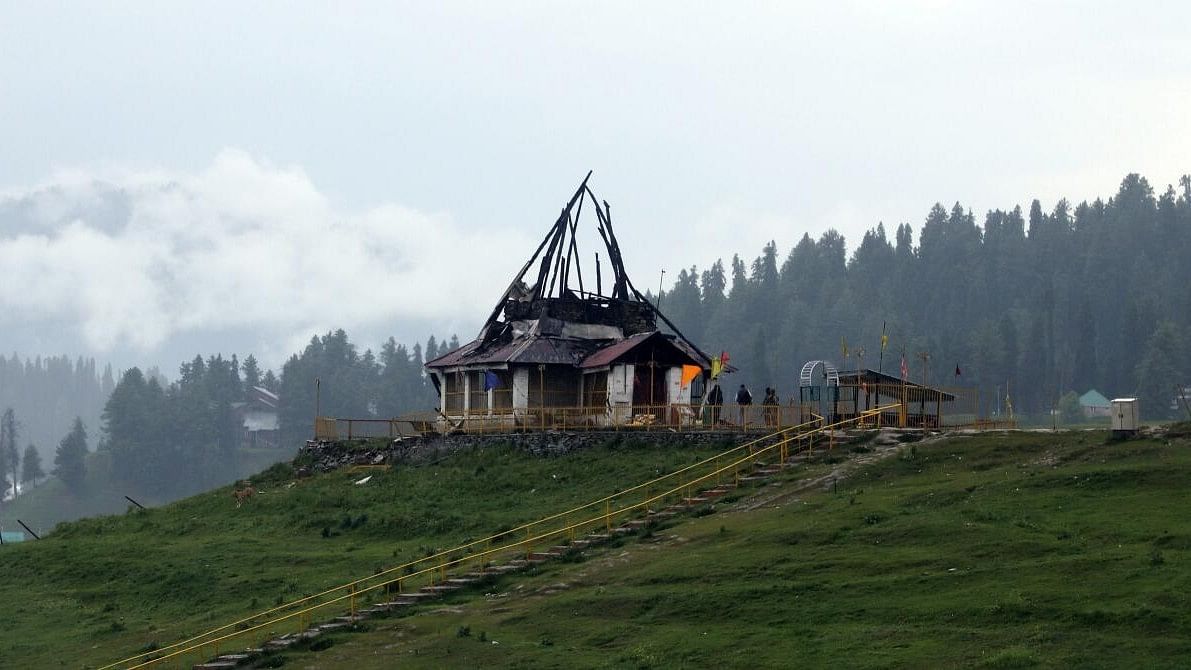 <div class="paragraphs"><p>A view of damaged iconic Shiv Temple that was gutted in a massive fire incident at famous tourist resort, in Gulmarg, Wednesday, June 5, 2024.</p></div>