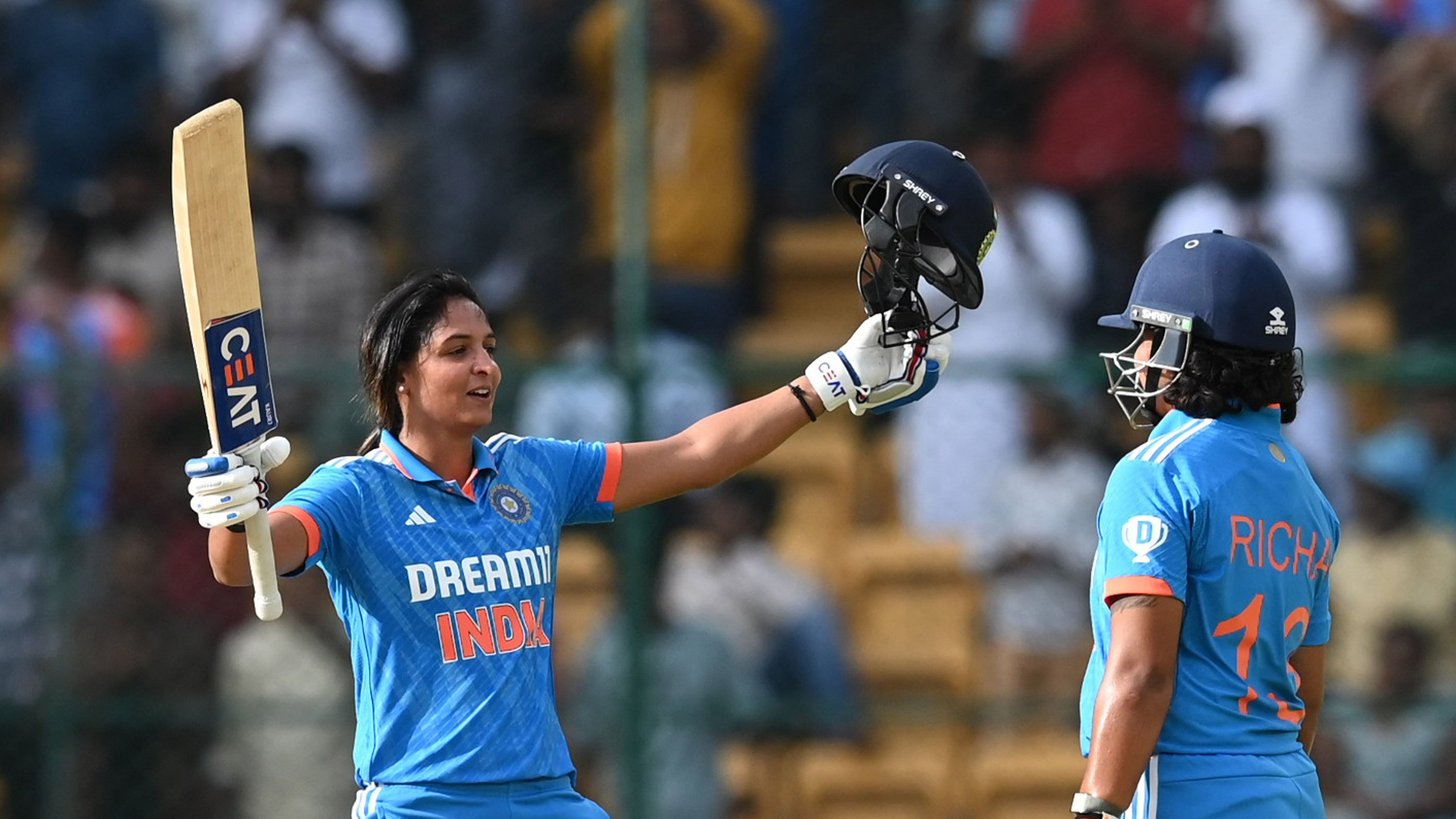 <div class="paragraphs"><p>India's Harmanpreet Kaur celebrates after scoring a century against South Africa during the second ODI match at M Chinnaswamy Stadium in Bengaluru on Wednesday. </p></div>