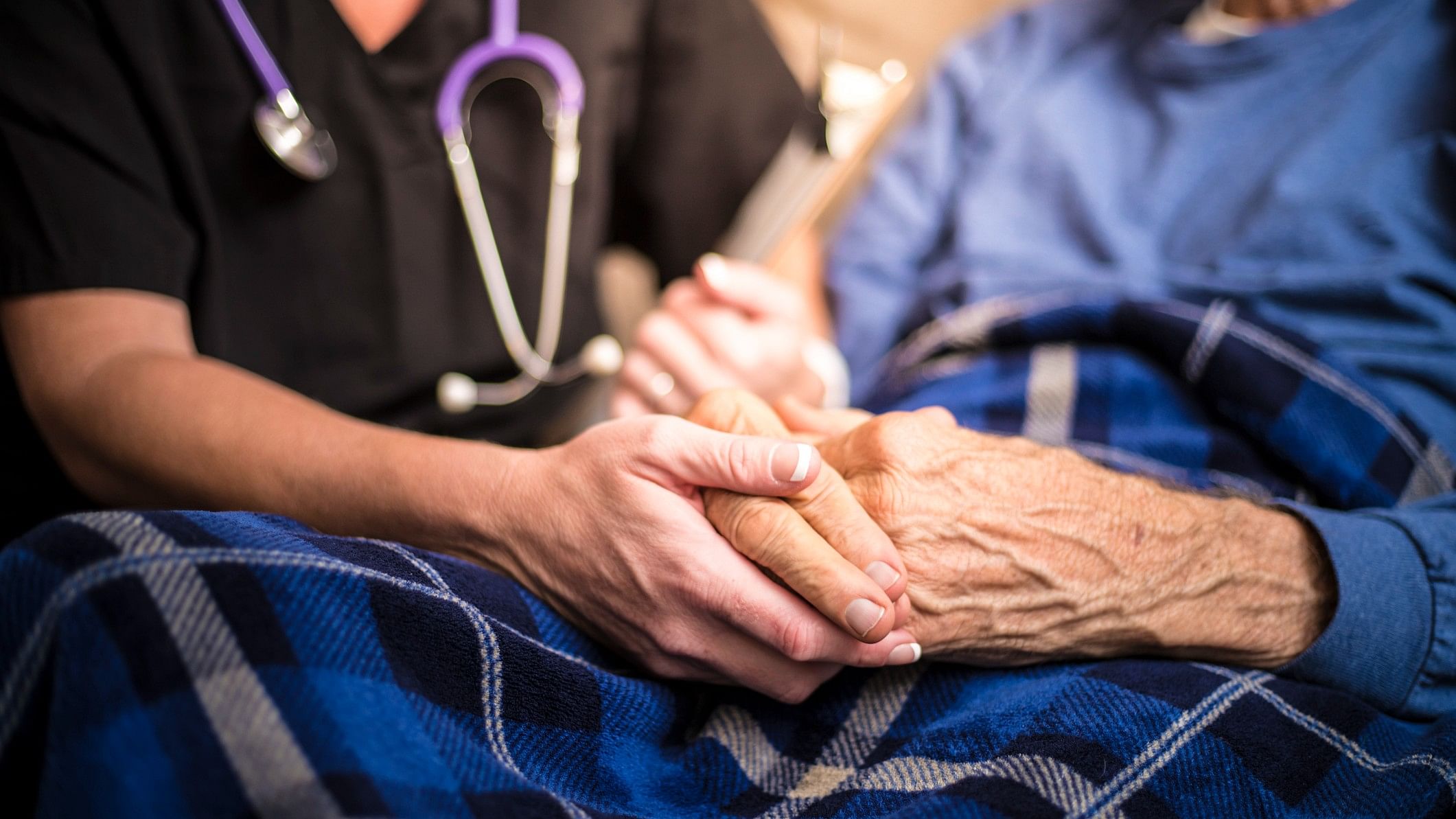 <div class="paragraphs"><p>Representative image of a nurse with a Parkinson's disease patient.</p></div>