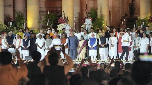 <div class="paragraphs"><p>President Droupadi Murmu and Vice President Jagdeep Dhankhar with Prime Minister Narendra Modi and other ministers at the swearing-in ceremony of new Union government, at Rashtrapati Bhavan in New Delhi, Sunday, June 9, 2024.</p></div>