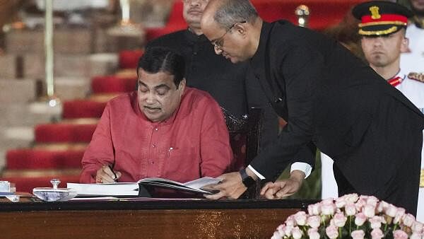 <div class="paragraphs"><p>BJP MP Nitin Gadkari takes oath as minister during the swearing-in ceremony of new Union government, at Rashtrapati Bhavan in New Delhi.&nbsp;</p></div>