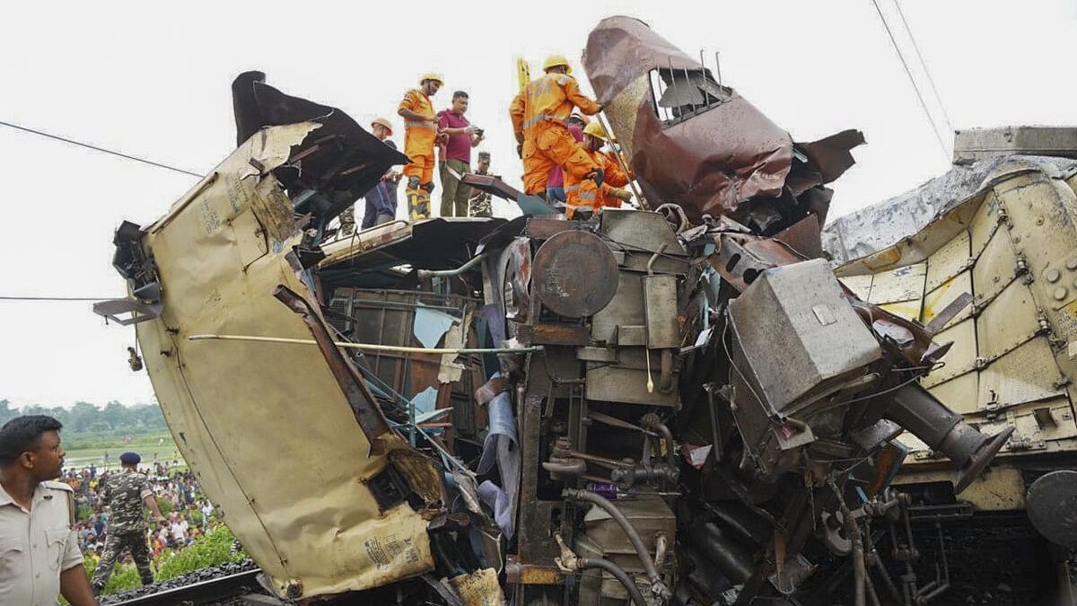 <div class="paragraphs"><p>Rescue work underway at the site after the collision between Kanchanjungha Express and a goods train, near Rangapani railway station.</p></div>