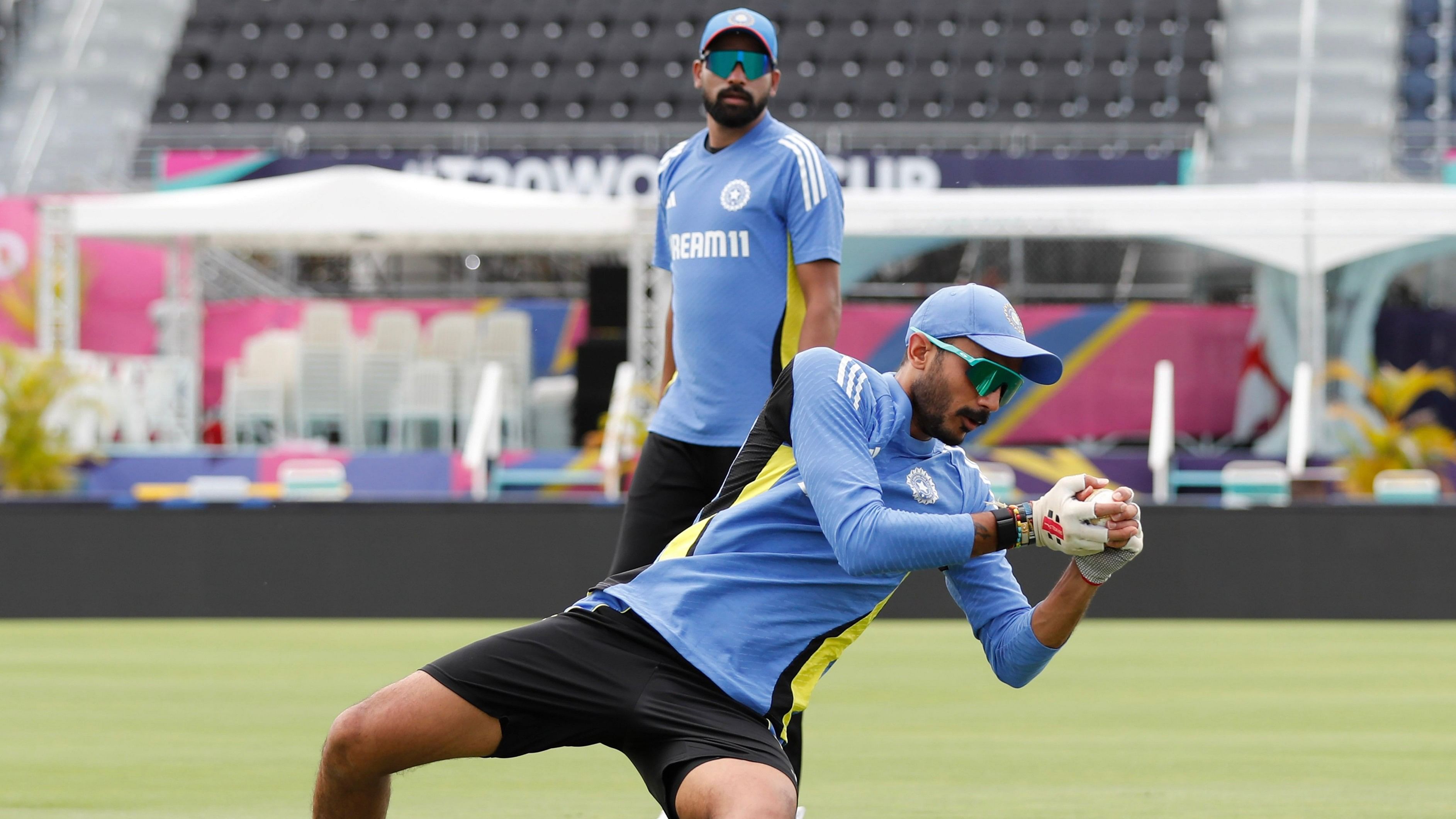 <div class="paragraphs"><p> India's Axar Patel and Mohammed Siraj during a practice session in Bridgetown, Barbados. </p></div>