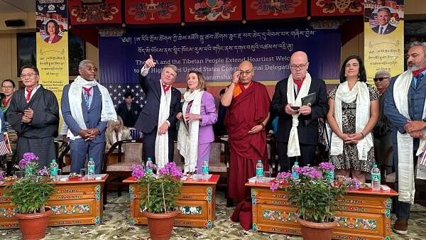 <div class="paragraphs"><p>Former US House speaker Nancy Pelosi along with Michael McCaul, the US Republican chair of the House Foreign Affairs Committee, takes part during a function at the Dalai LamaÕs temple after meeting with him in Dharamshala.</p></div>