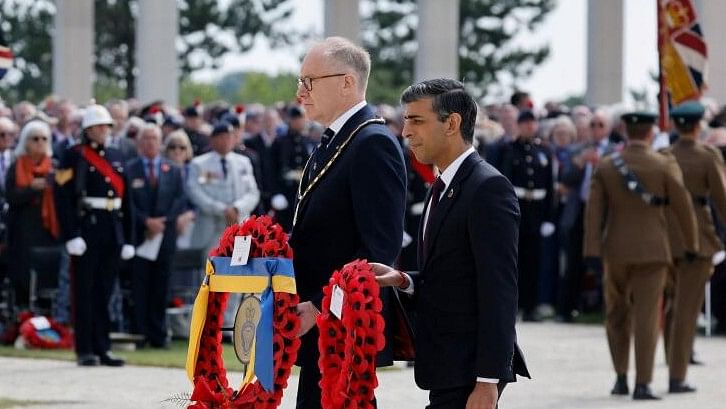 <div class="paragraphs"><p>Britain's Prime Minister Rishi Sunak attends the UK Ministry of Defence and the Royal British Legion's commemorative ceremony marking the 80th anniversary of the World War II "D-Day" Allied landings in Normandy, at the World War II British Normandy Memorial near the village of Ver-sur-Mer which overlooks Gold Beach and Juno Beach in northwestern France.</p></div>