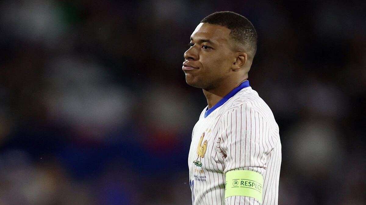 <div class="paragraphs"><p>France's Kylian Mbappe reacts during the international friendly against Canada.</p></div>