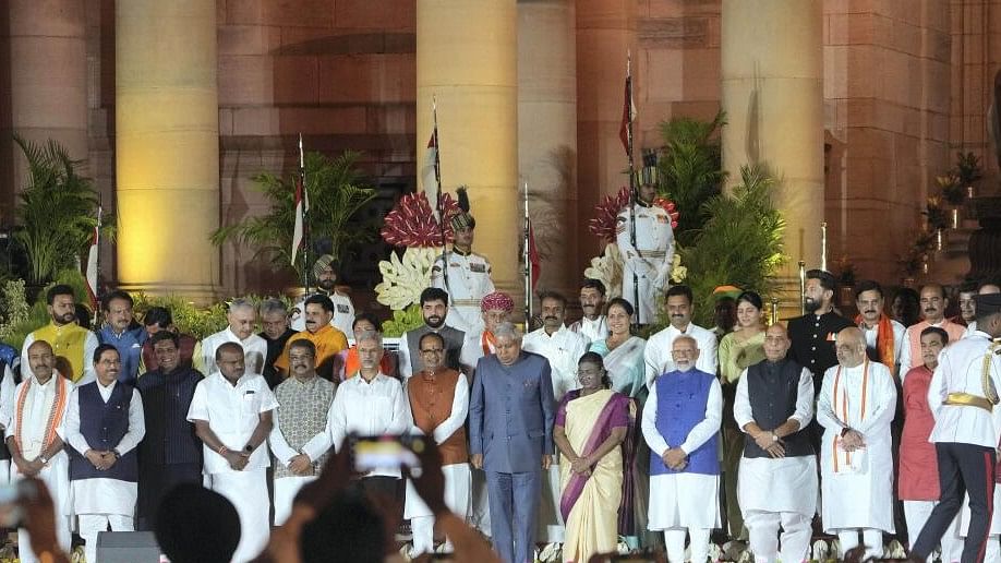 <div class="paragraphs"><p>President Droupadi Murmu and Vice President Jagdeep Dhankhar with Prime Minister Narendra Modi and other ministers at the swearing-in ceremony of new Union government, at Rashtrapati Bhavan in New Delhi, Sunday</p></div>